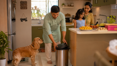 Indian family keeping fatty festival food safely away from their dog to prevent pancreatitis